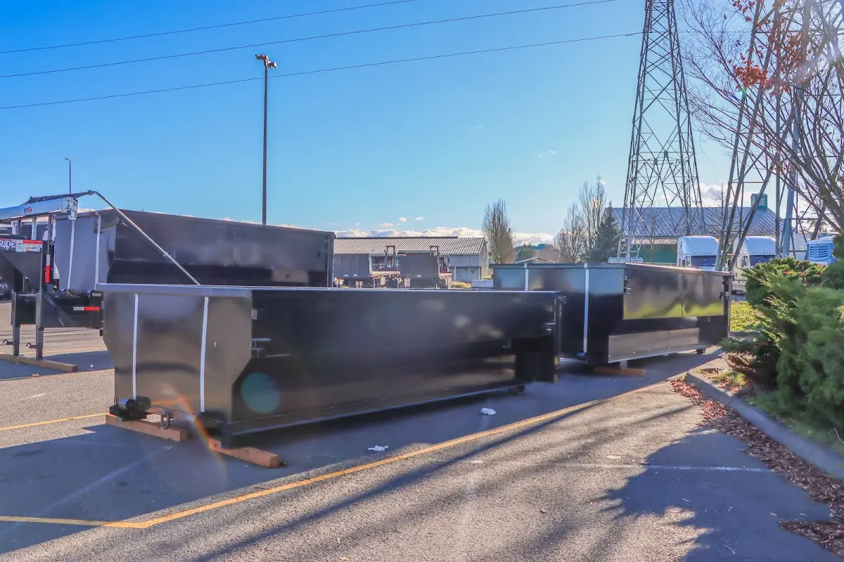 Roll-off dumpster ready for waste disposal at job site for Yard Waste Dumpster Rental in Vincennes